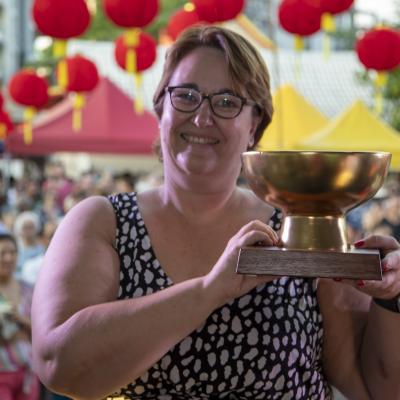 Susan from Cold Rock holding her laksa trophy